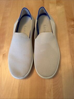 Rothy's Slip-On Sneakers in Beige with Blue Trim